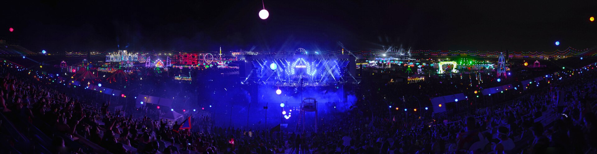 Electric Daisy Carnival Las Vegas with fireworks above kinetic stage at night