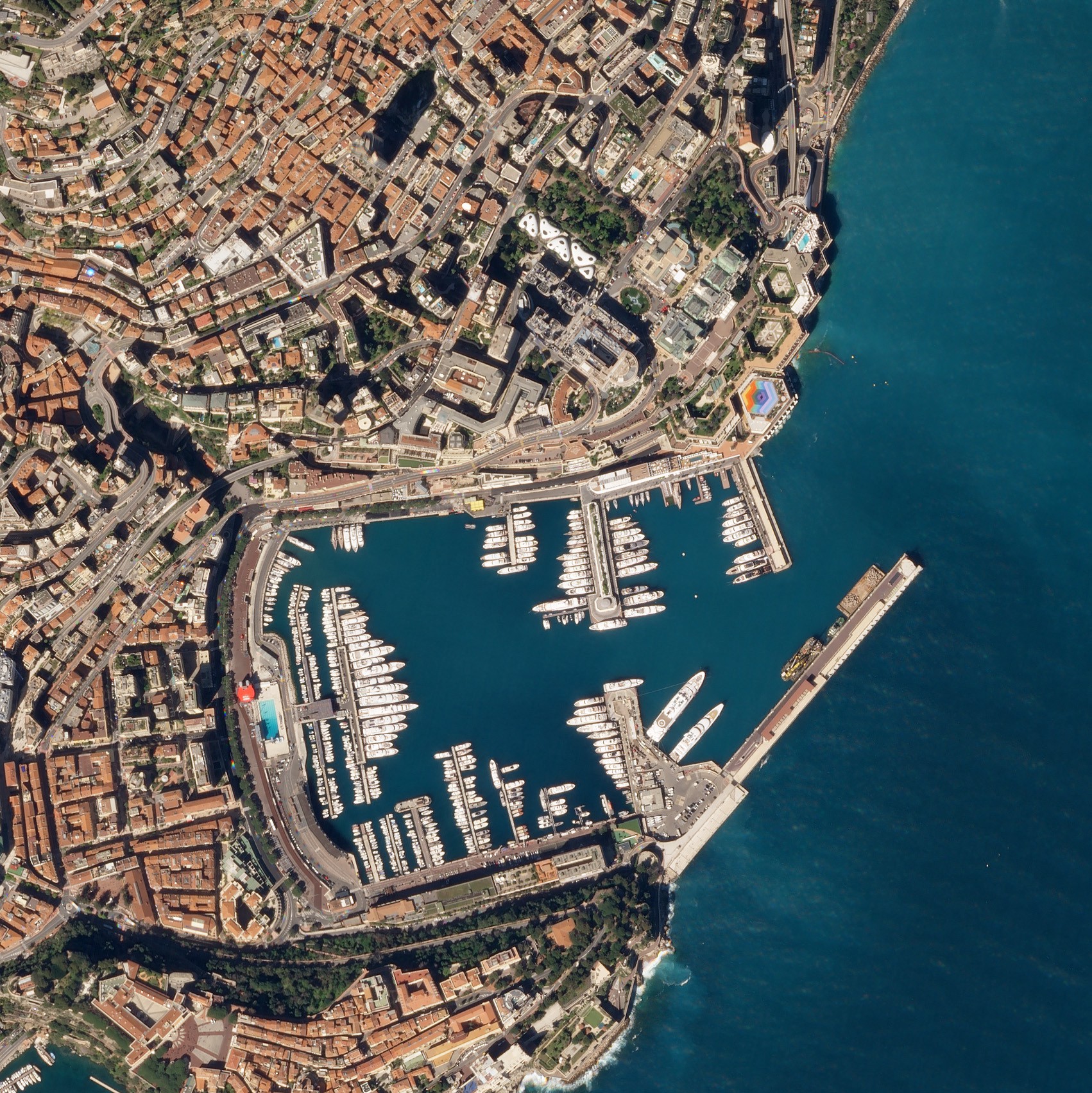 Formula 1 Monaco Grand Prix cars racing through Casino Square Monte Carlo streets
