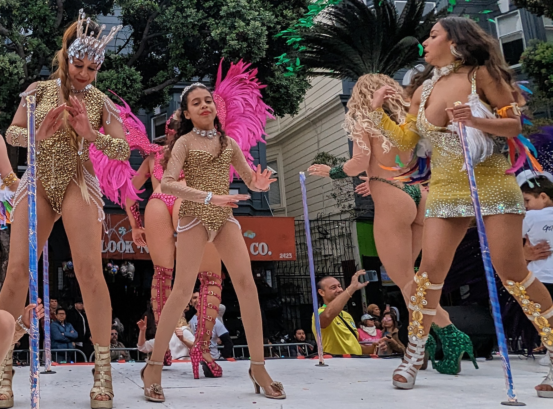 Samba dancers in elaborate feathered costumes at Rio Carnival in the Sambadrome